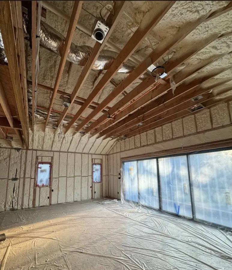 Interior walls and ceiling insulated with spray foam during new construction in Fishhook